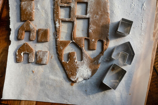 rolled gingerbread dough cookies on parchment 