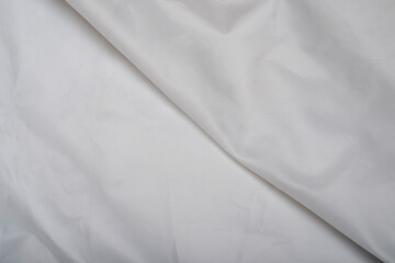 White silky fabric making background with a line in center