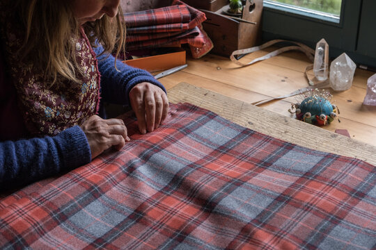 pleating tartan with pins 