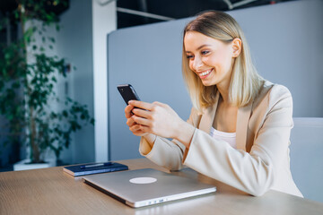 girl watching a socila media on smartphone, using the internet c