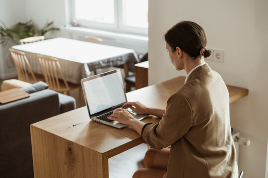 Stay home, blog, social media concept. Woman working at home.