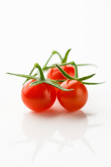 cherry tomatoes on white background