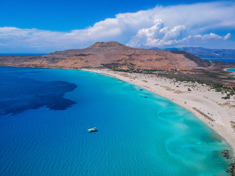 Aerial view of Simos beach in Elafonisos island in Greece. Elafonisos is a small Greek island the Peloponnese with idyllic exotic beaches and crystal clear waters. Laconia, Greece, Europe