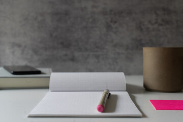 Notepad and pen on desk