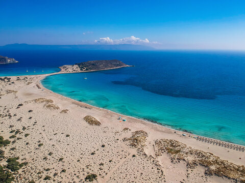 Aerial view of Simos beach in Elafonisos island in Greece. Elafonisos is a small Greek island the Peloponnese with idyllic exotic beaches and crystal clear waters. Laconia, Greece, Europe