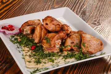 Grilled chicken barbecue served herbs