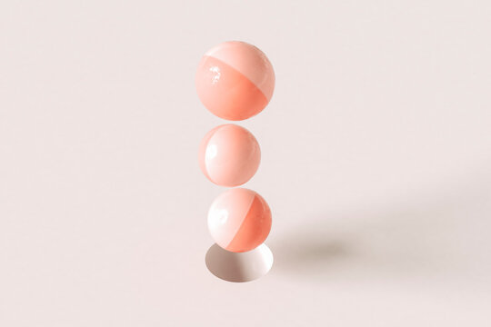 Pink spheres floating on a hole