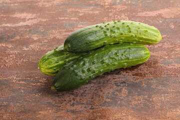 Fersh juicy green cucumbers heap