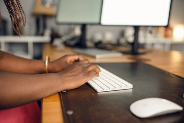 woman typing on  keyboard 