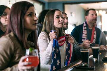 Brewery: Group Watches USA Sporting Event With Concerned Looks