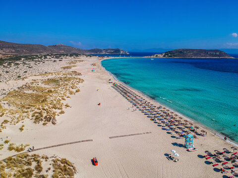 Aerial view of Simos beach in Elafonisos island in Greece. Elafonisos is a small Greek island the Peloponnese with idyllic exotic beaches and crystal clear waters. Laconia, Greece, Europe