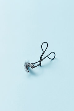 Eyelash curler with false eyelashes