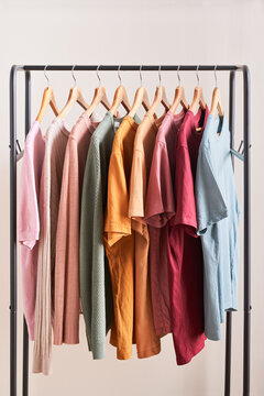 Bright clothing on rail.
