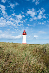 Fototapeta na wymiar Lighthouse List West in summer, Sylt, Schleswig-Holstein, Germany