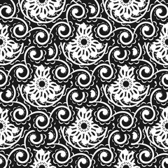 Wallpaper in a baroque style pattern. Black and white floral element. Graphic ornament for wallpaper, fabric, wrapping, packaging. Damask floral ornament.