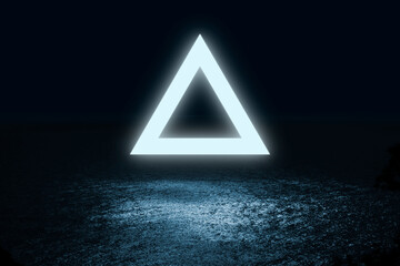 triangle of light fluctuate over the water