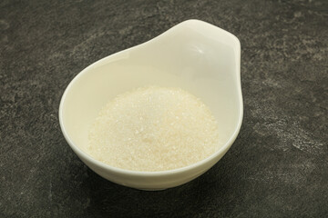 White sugar in the bowl