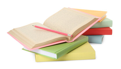 Many colorful hardcover books with pencil on white background