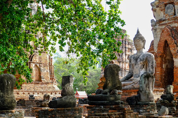 Ancient pagoda and Buddha statue in Wat Mahathat , Ayutthaya