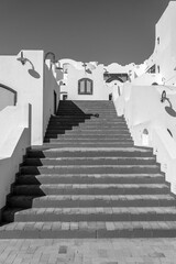 Detail of stairs and white wall of a house on the street of Egypt in Sharm El Sheikh, black and white