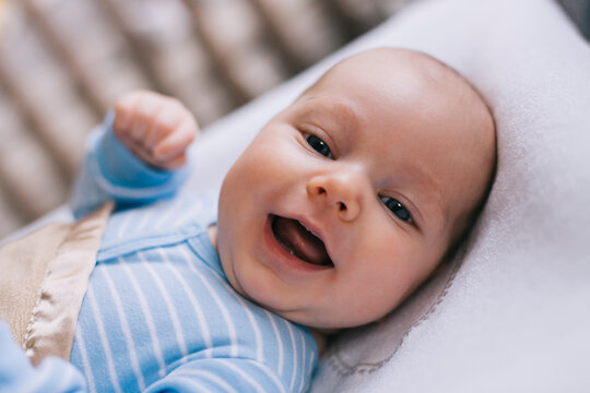 Laughing newborn baby