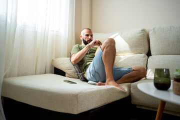 modern man relaxing at home