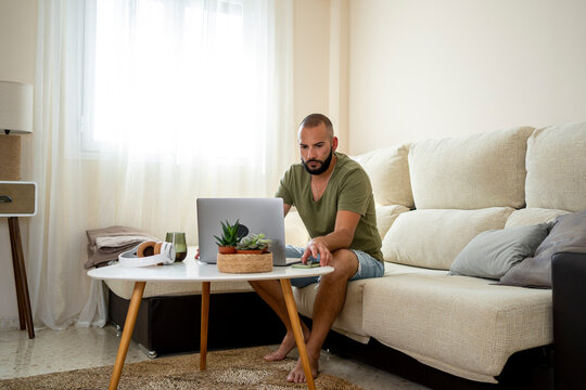 Modern Man Relaxing At Home