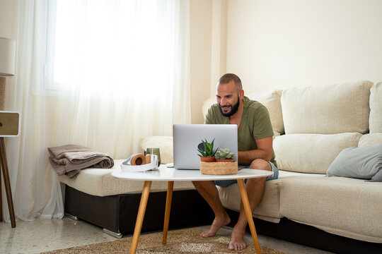 Modern man using his laptop