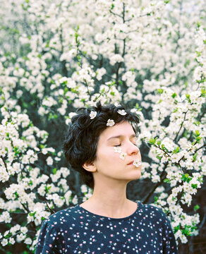 Woman with short hair style enjoying bloom 