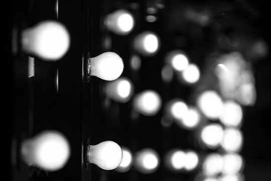 Make-up artists mirrors with light bulbs, Fashion Show themed photo.