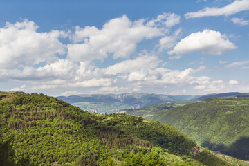 Beautiful Summer Mountain Landscape with Green Hills and Cloudy Sky .Bov Village in  Balkan Mountain ,Bulgaria 