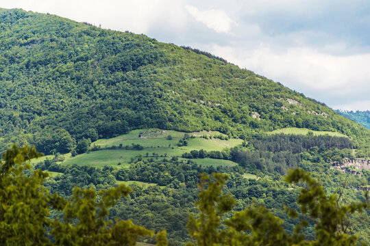 Beautiful Summer Mountain Landscape with Green Hills and Cloudy Sky .Bov Village in  Balkan Mountain ,Bulgaria 