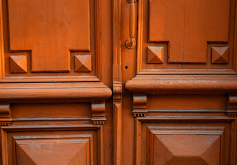 The texture of the vintage old door is brown. A beautiful architectural structure.