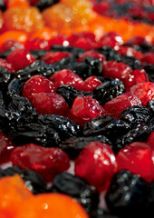 Beautiful berry and fruit mix pattern of dried berries. Explosion of flavors cherry,  apple, apricot, grape, raisins, pineapple, peach, plum, prune.