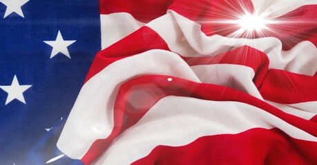 Bright spot of light against close up of american flag