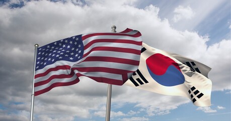 American and south korea flag waving against clouds in blue sky