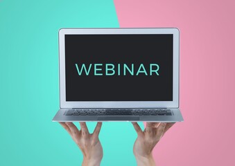 Composition of webinar text on screen of laptop held by hands, on turquoise and pink background