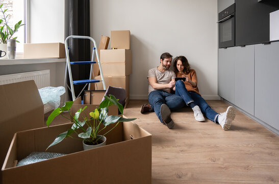 Relaxing On The Floor At New Apartment