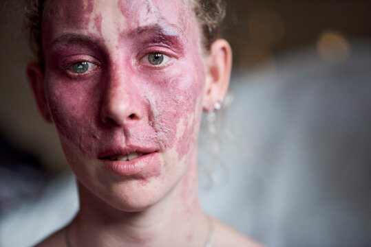 Portrait of a young woman looking at the camera