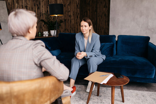 Woman discussing problems with psychologist 