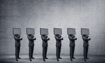 Businessmen with TV instead of head.