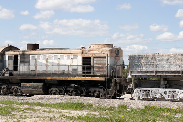 Naklejka premium freight train and one car working on chalk mining