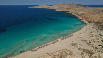 Aerial drone photo of beautiful sandy bay and double turquoise exotic beach of Simos resembling a blue lagoon in small island of Elafonisos, Lakonia, Peloponnese, Greece