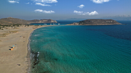 Aerial photo taken by drone of Caribbean tropical exotic island bay with turquoise clear sea sandy beaches resembling a blue lagoon visited by sail boats