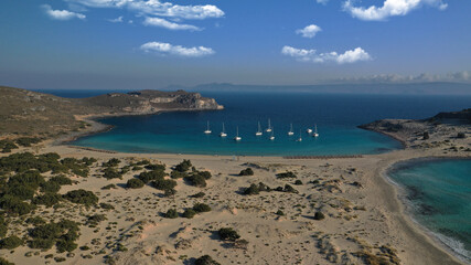 Aerial drone photo of beautiful sandy bay and double turquoise exotic beach of Simos resembling a blue lagoon in small island of Elafonisos, Lakonia, Peloponnese, Greece