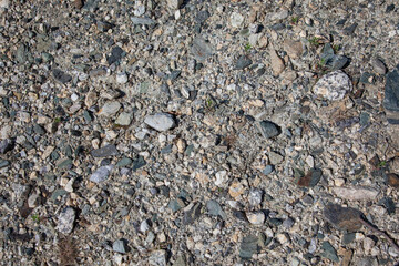 Abstract background with pattern of gravel stones. Gravel colorful rock texture. Floor texture with stones and rocks.
