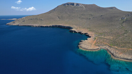 Aerial drone photo of main port of Kythera island and turquoise exotic beach of Diakofti, Ionian, Greece