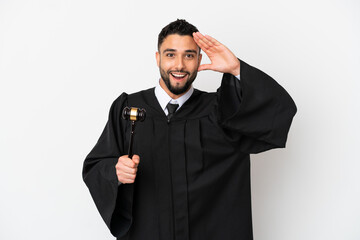 Judge arab man isolated on white background with surprise expression