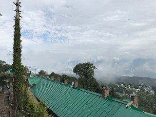 A picture of Himalayan mountains and valleys from a high point in the hill station of Dalhousie, in...