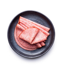 Sliced smoked salami on plate